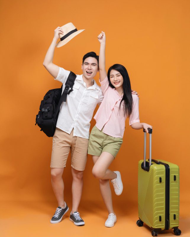 Young Asian Couple Travel Concept Background